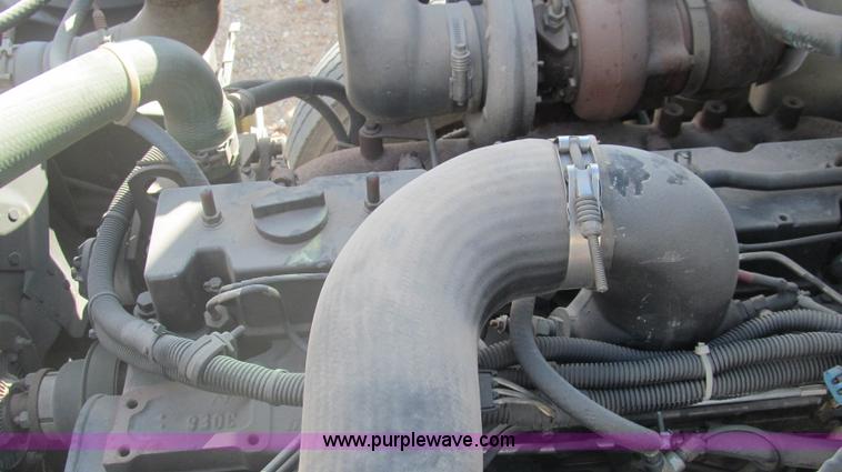 image for item F3054 1997 Freightliner FL70 semi truck