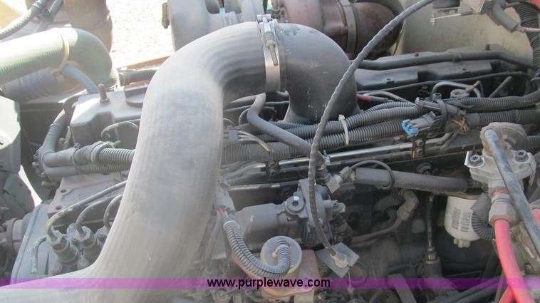 image for item F3054 1997 Freightliner FL70 semi truck