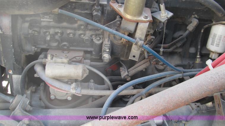 image for item F3054 1997 Freightliner FL70 semi truck