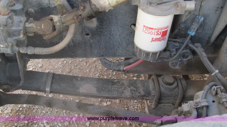 image for item F3054 1997 Freightliner FL70 semi truck