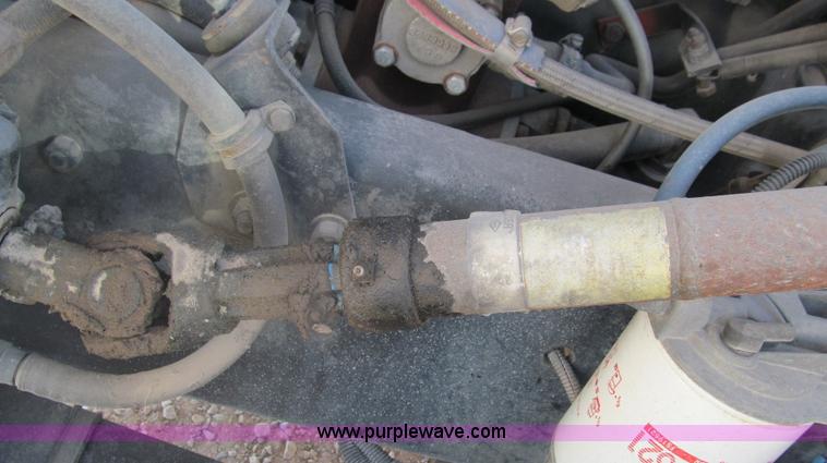 image for item F3054 1997 Freightliner FL70 semi truck