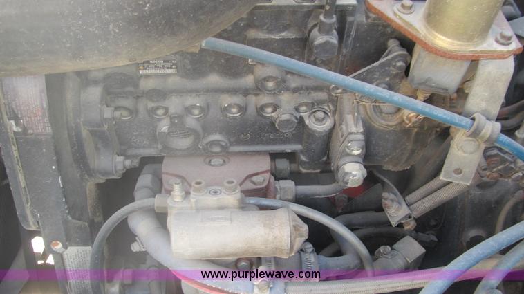 image for item F3054 1997 Freightliner FL70 semi truck