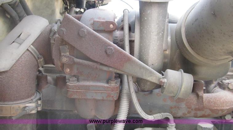 image for item F3054 1997 Freightliner FL70 semi truck