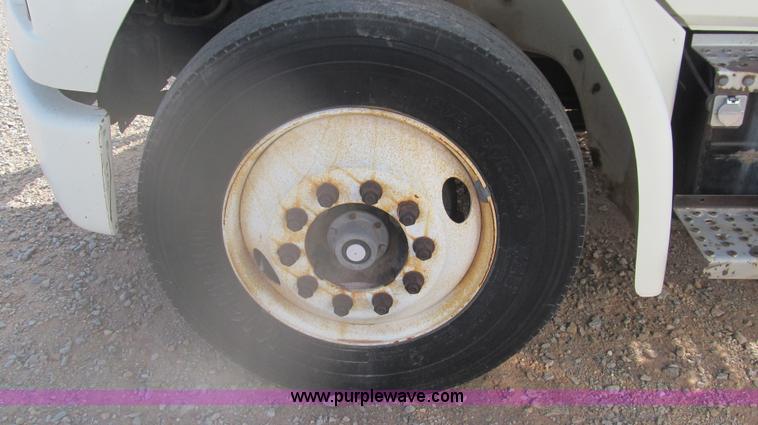 image for item F3054 1997 Freightliner FL70 semi truck