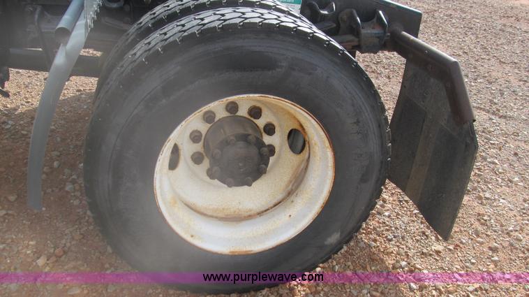 image for item F3054 1997 Freightliner FL70 semi truck