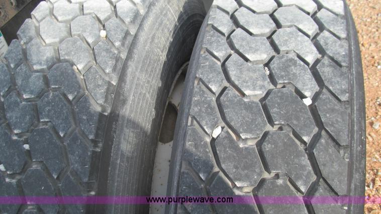 image for item F3054 1997 Freightliner FL70 semi truck