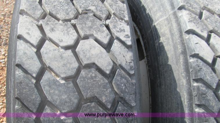 image for item F3054 1997 Freightliner FL70 semi truck