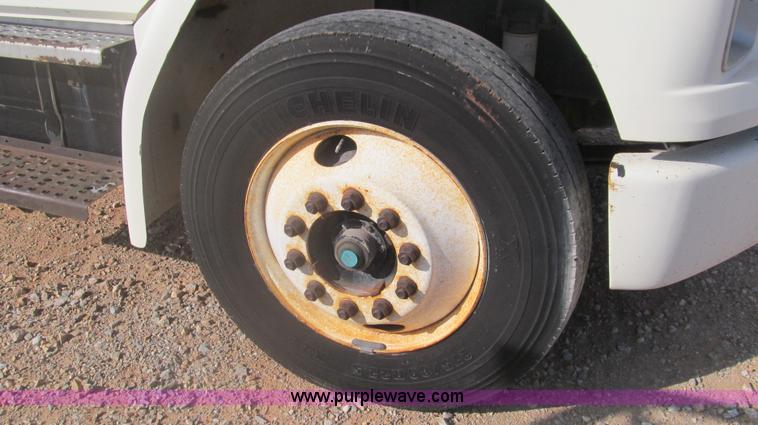 image for item F3054 1997 Freightliner FL70 semi truck