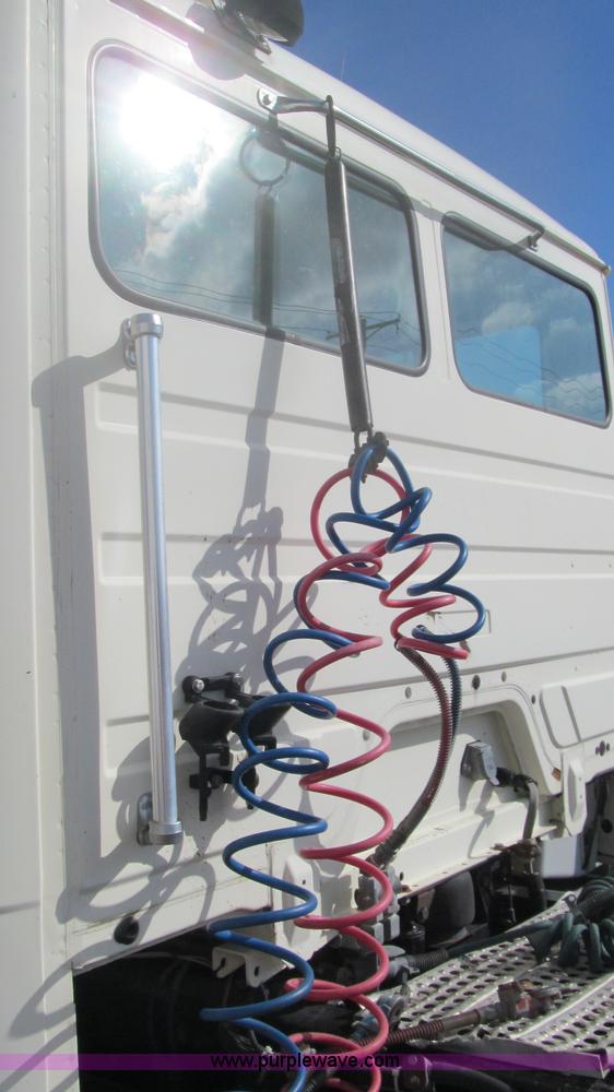 image for item F3054 1997 Freightliner FL70 semi truck