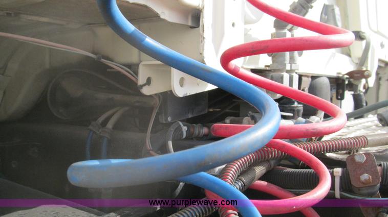 image for item F3054 1997 Freightliner FL70 semi truck