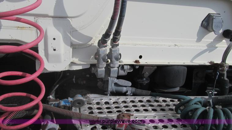 image for item F3054 1997 Freightliner FL70 semi truck