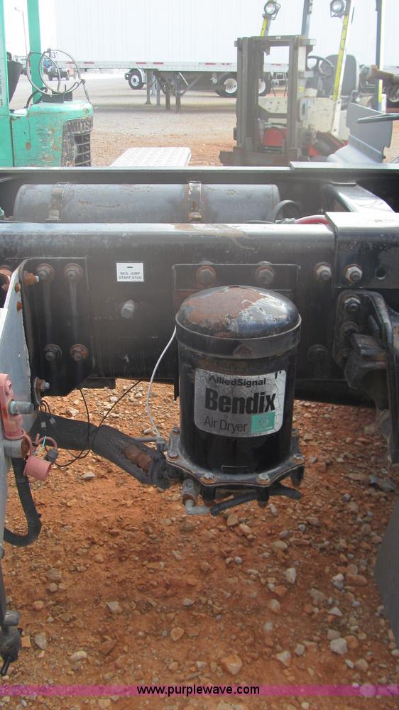 image for item F3054 1997 Freightliner FL70 semi truck