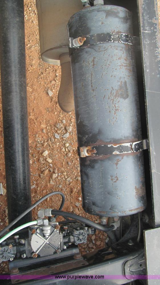 image for item F3054 1997 Freightliner FL70 semi truck