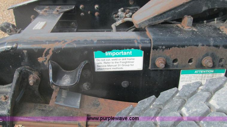 image for item F3054 1997 Freightliner FL70 semi truck