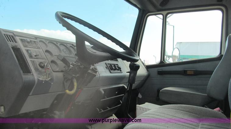 image for item F3054 1997 Freightliner FL70 semi truck