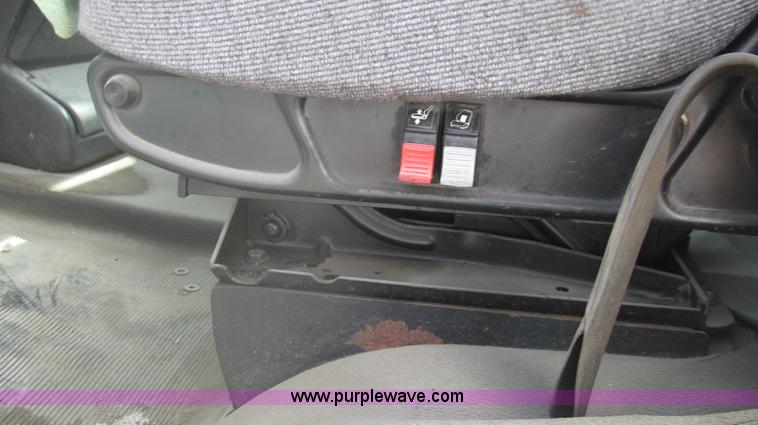 image for item F3054 1997 Freightliner FL70 semi truck