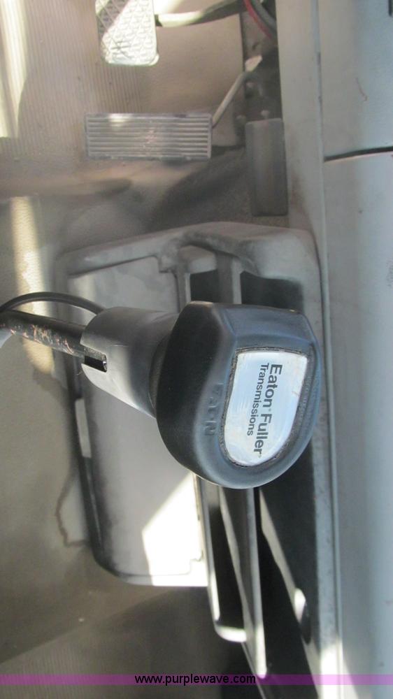 image for item F3054 1997 Freightliner FL70 semi truck