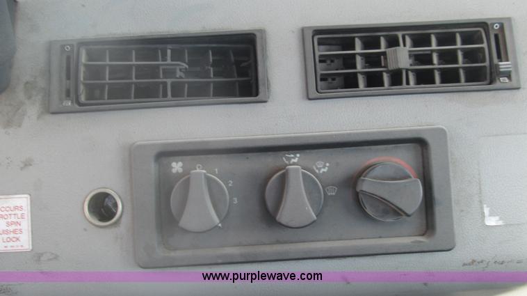 image for item F3054 1997 Freightliner FL70 semi truck