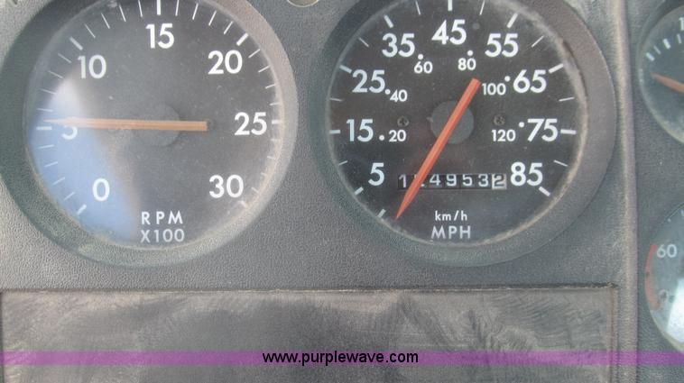 image for item F3054 1997 Freightliner FL70 semi truck