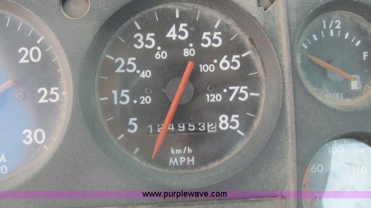 image for item F3054 1997 Freightliner FL70 semi truck