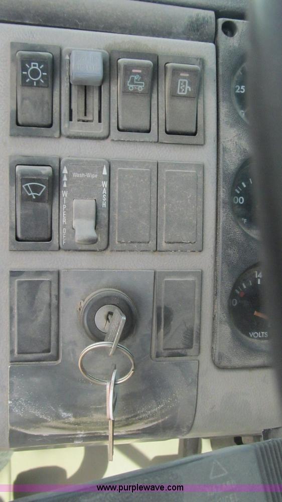 image for item F3054 1997 Freightliner FL70 semi truck