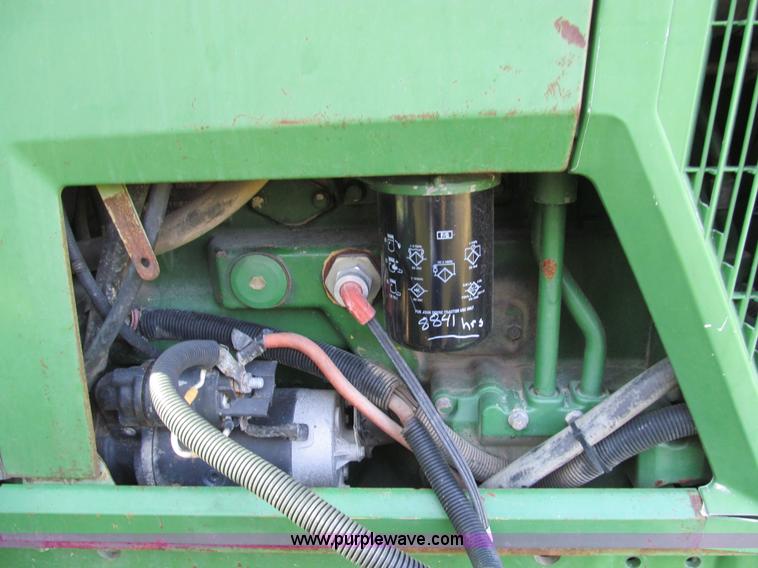 image for item E3534 1994 John Deere 6400 tractor