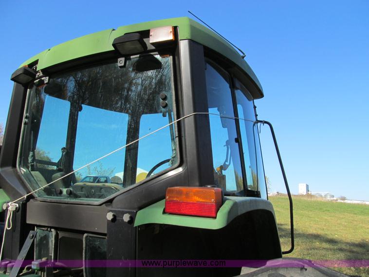 image for item E3534 1994 John Deere 6400 tractor