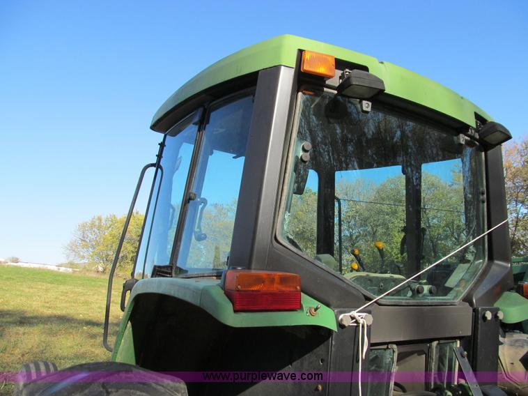 image for item E3534 1994 John Deere 6400 tractor