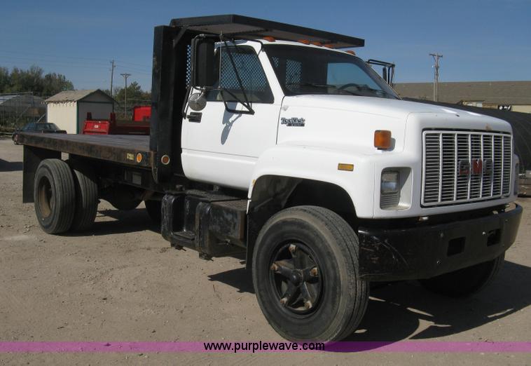 image for item B8272 1991 GMC TopKick SLE flatbed dump truck