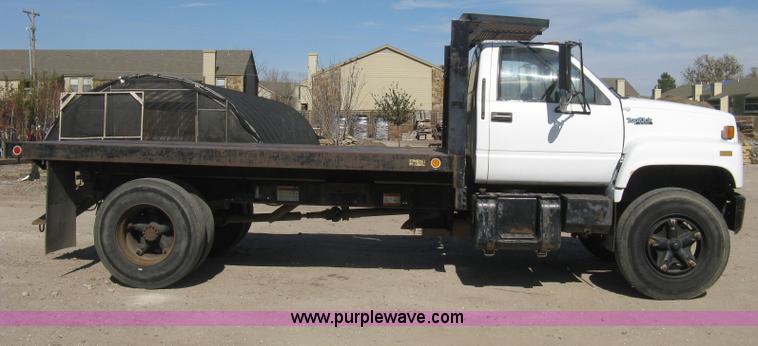 image for item B8272 1991 GMC TopKick SLE flatbed dump truck