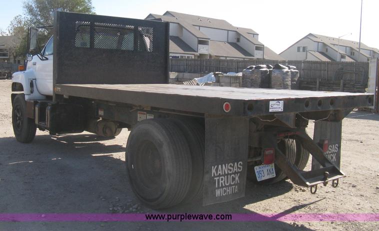 image for item B8272 1991 GMC TopKick SLE flatbed dump truck