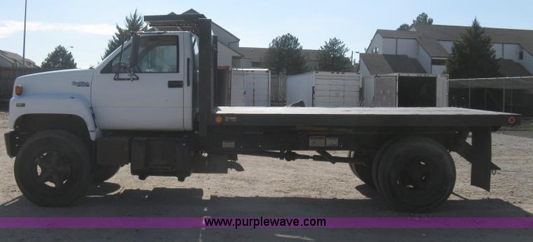 image for item B8272 1991 GMC TopKick SLE flatbed dump truck