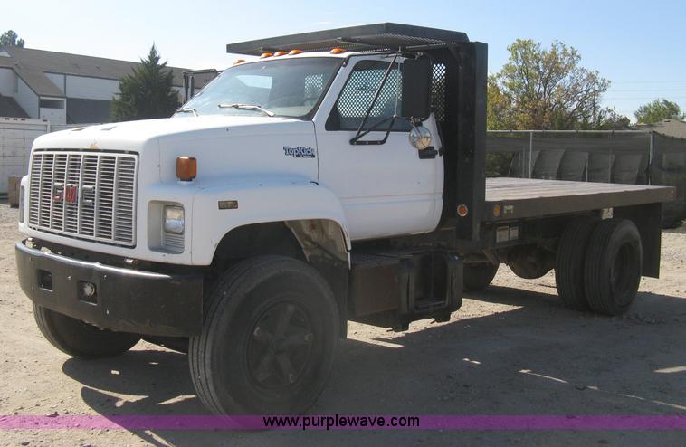 image for item B8272 1991 GMC TopKick SLE flatbed dump truck