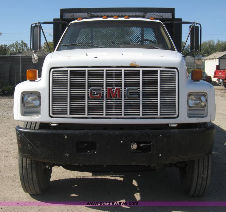 image for item B8272 1991 GMC TopKick SLE flatbed dump truck