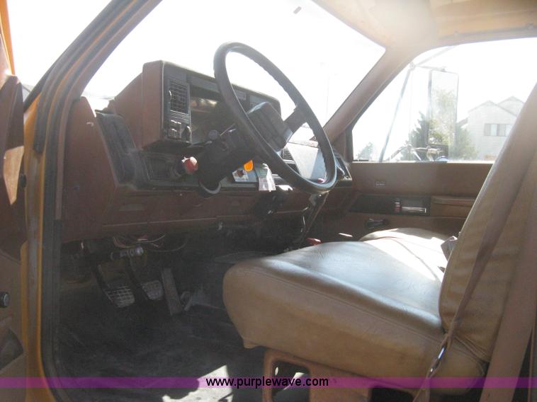 image for item B8272 1991 GMC TopKick SLE flatbed dump truck