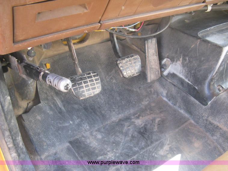 image for item B8272 1991 GMC TopKick SLE flatbed dump truck