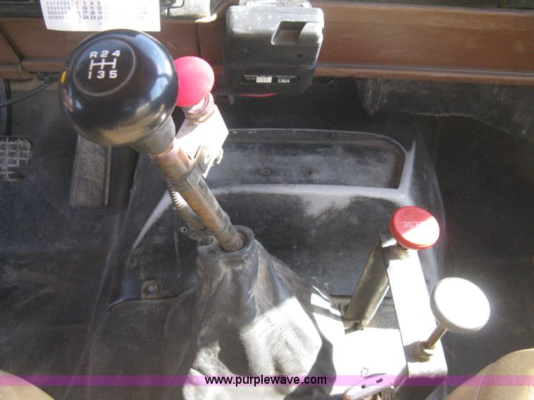 image for item B8272 1991 GMC TopKick SLE flatbed dump truck