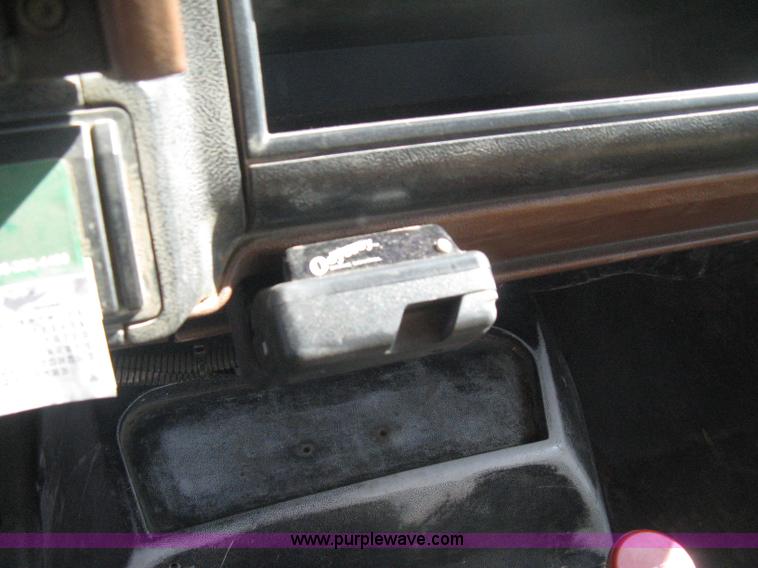 image for item B8272 1991 GMC TopKick SLE flatbed dump truck