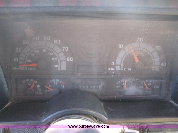 image for item B8272 1991 GMC TopKick SLE flatbed dump truck