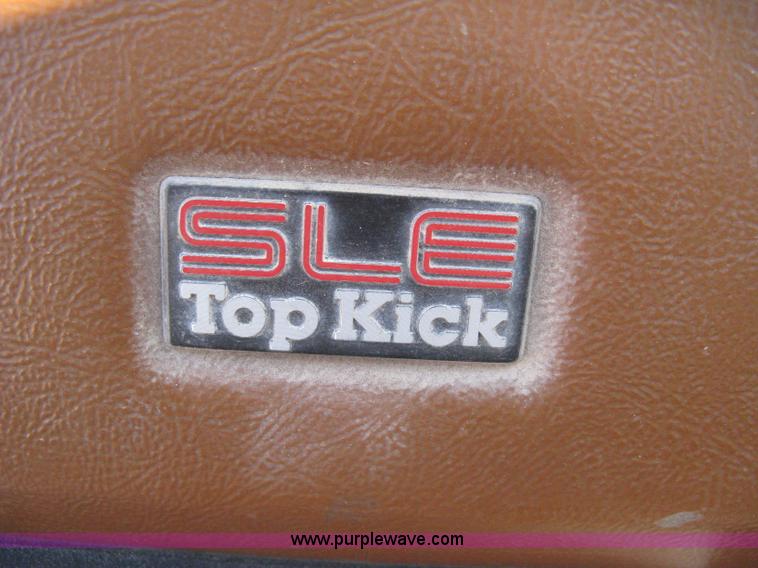 image for item B8272 1991 GMC TopKick SLE flatbed dump truck