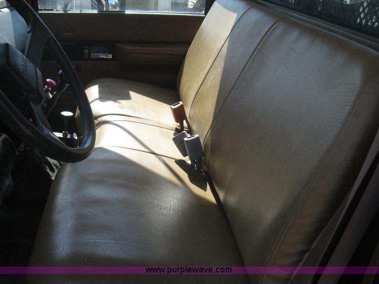 image for item B8272 1991 GMC TopKick SLE flatbed dump truck