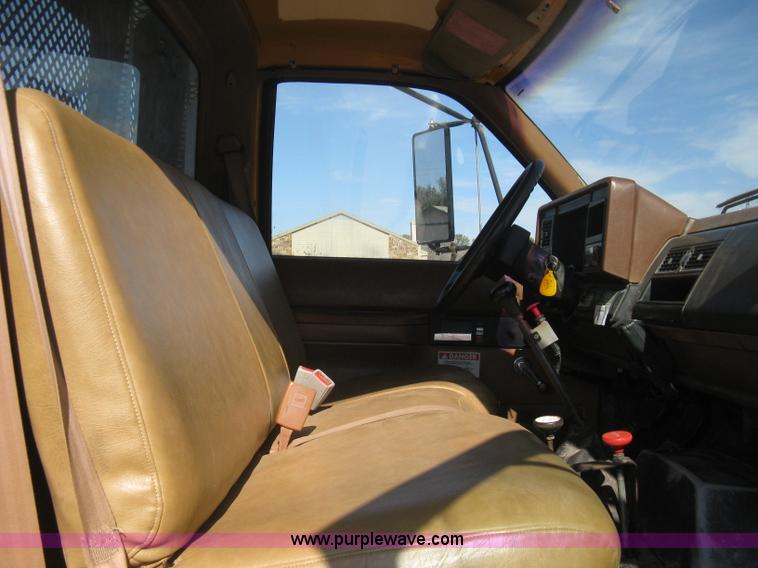 image for item B8272 1991 GMC TopKick SLE flatbed dump truck