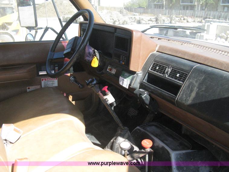 image for item B8272 1991 GMC TopKick SLE flatbed dump truck