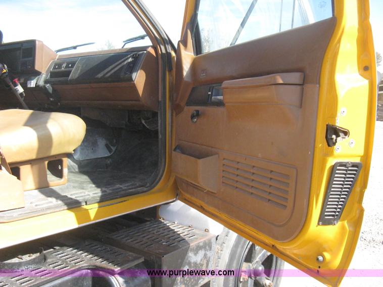 image for item B8272 1991 GMC TopKick SLE flatbed dump truck