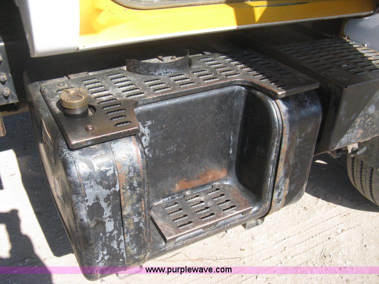 image for item B8272 1991 GMC TopKick SLE flatbed dump truck