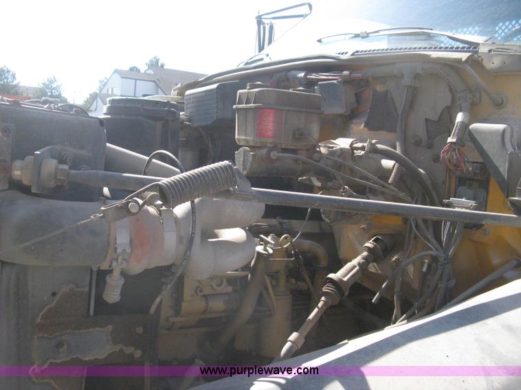 image for item B8272 1991 GMC TopKick SLE flatbed dump truck