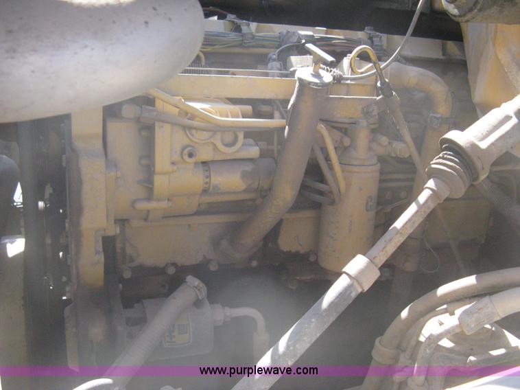 image for item B8272 1991 GMC TopKick SLE flatbed dump truck