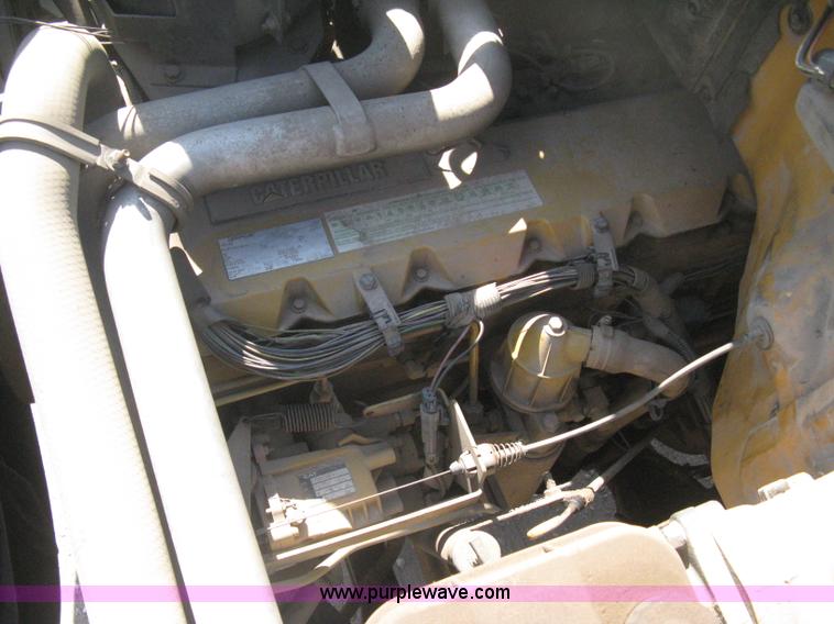 image for item B8272 1991 GMC TopKick SLE flatbed dump truck