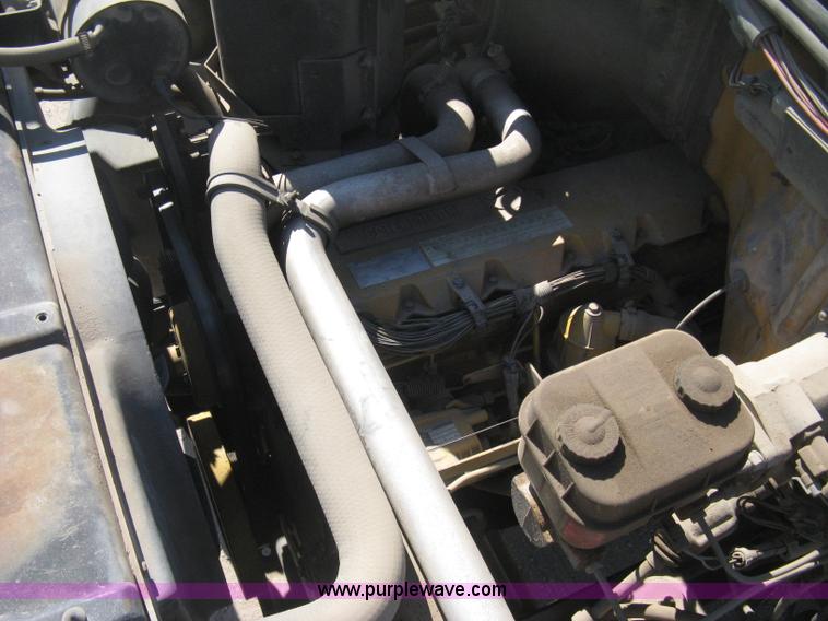 image for item B8272 1991 GMC TopKick SLE flatbed dump truck