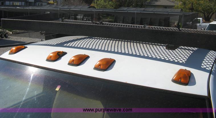 image for item B8272 1991 GMC TopKick SLE flatbed dump truck